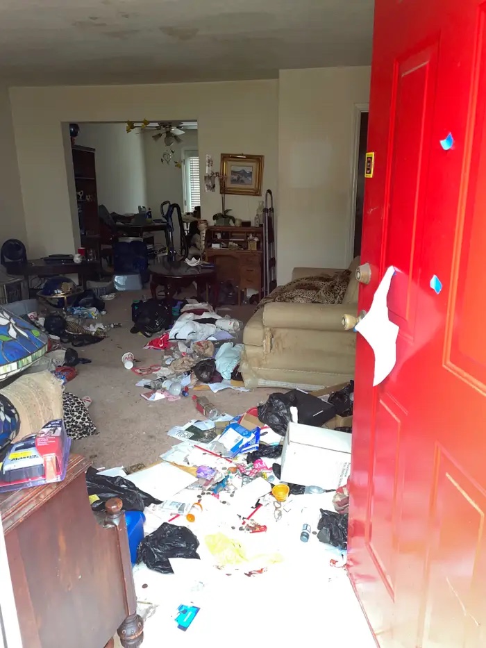 Cluttered interior of the hoarder condo, Teagan's first purchase